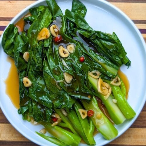 Chinese Broccoli with brown sauce on white plate 2