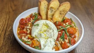 Roasted Tomatoes with Burrata and Crostini