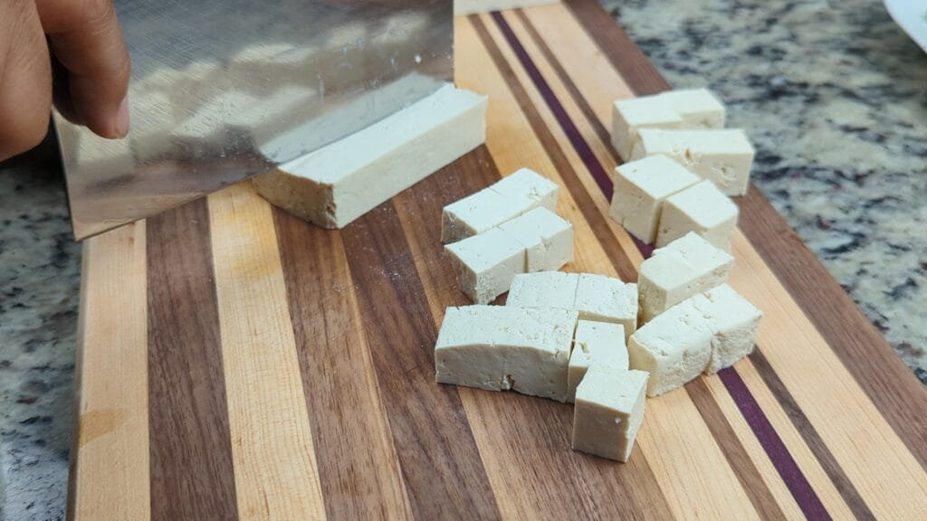 Cut Tofu into 3/4" cubes.