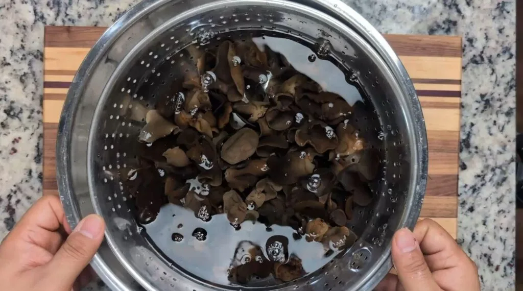 soaking wood ear mushrooms in an ice bath