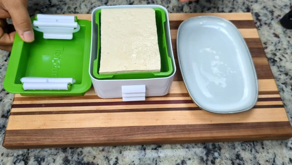 Press the Tofu for 10 mins for Thai Basil Braised Tofu