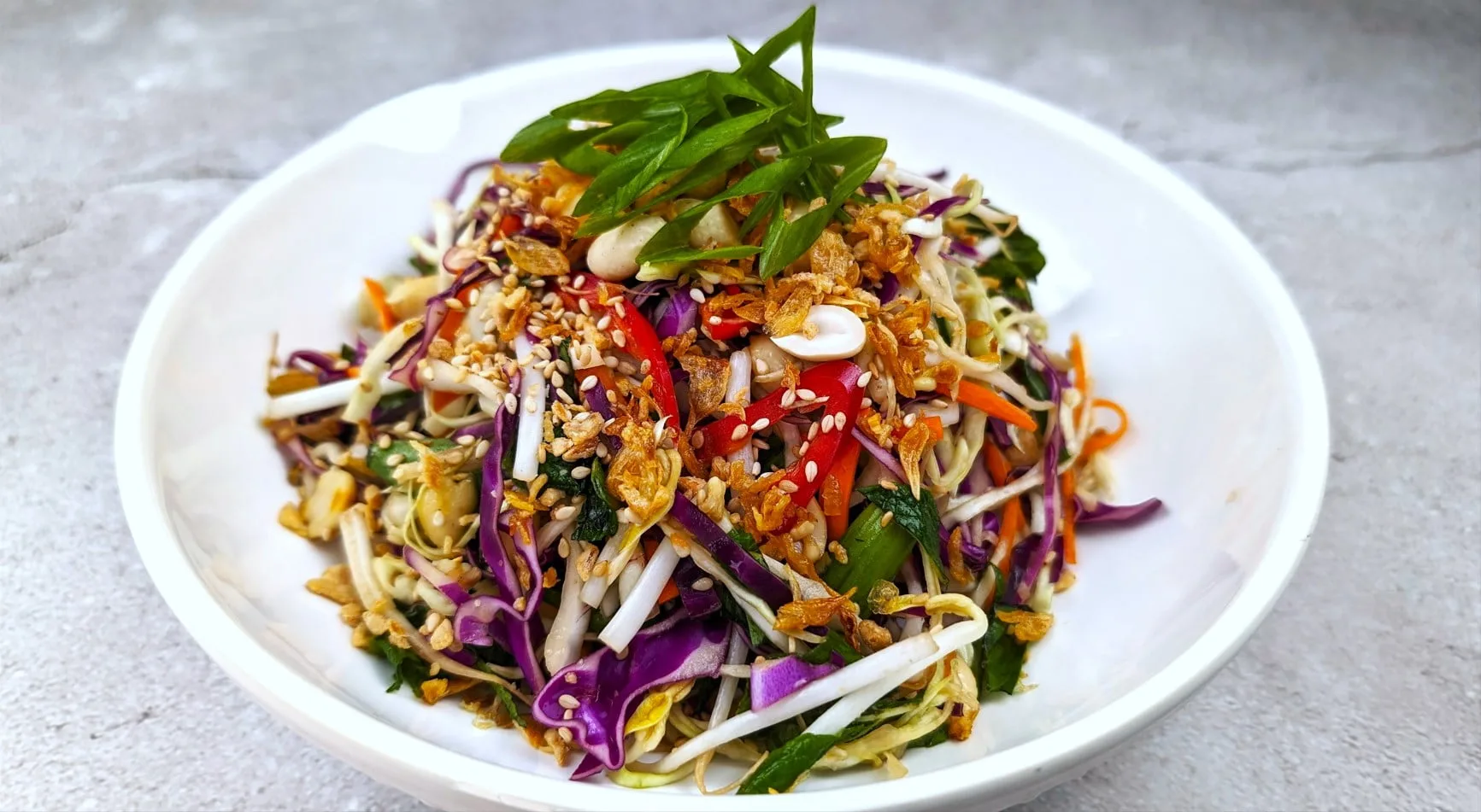 Asian Coleslaw on a white bowl