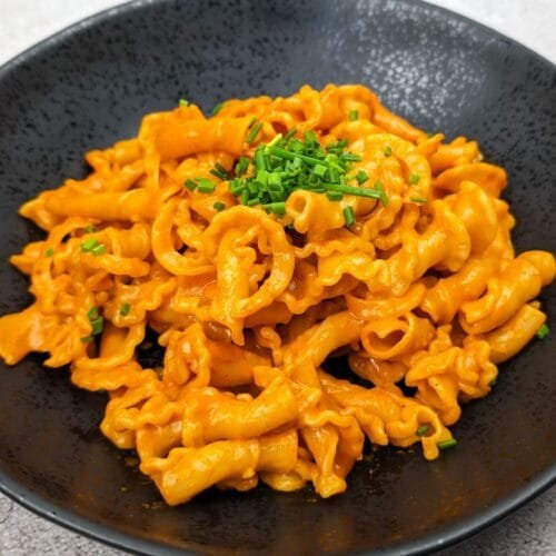 Gochujang Pasta in a Black Bowl