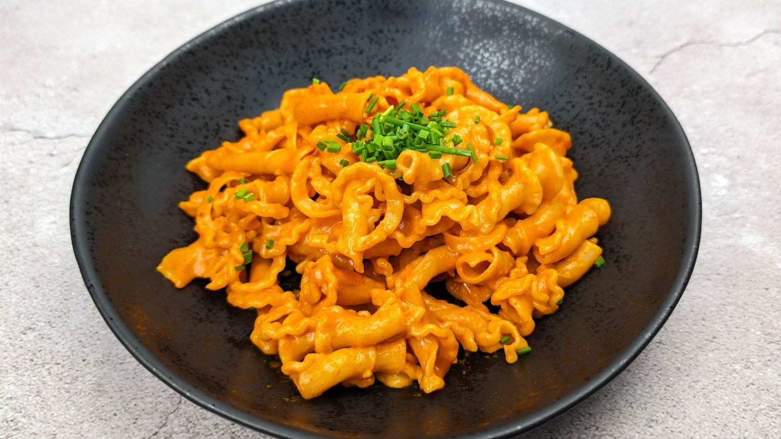 Gochujang Pasta in a Black Bowl