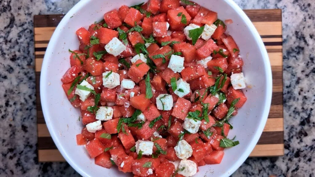 Watermelon Feta Salad in a large salad bowl mixed