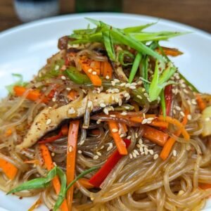 Japchae Noodles in a White Bowl