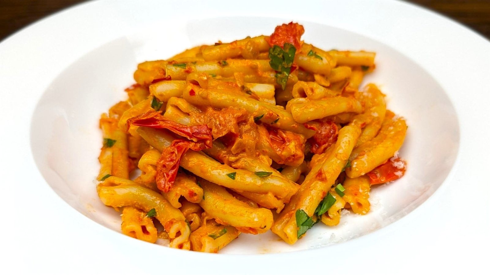 Spicy Harissa Pasta served in a white plate