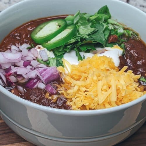 Vegan Chili in bowl with toppings