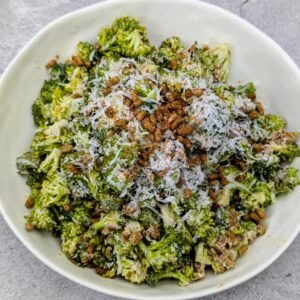 Broccoli Caesar Salad served in a white bowl