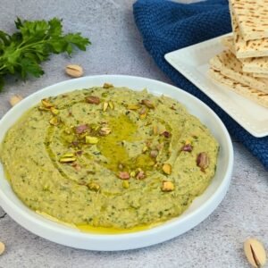 Zucchini Baba Ganoush in a white plate