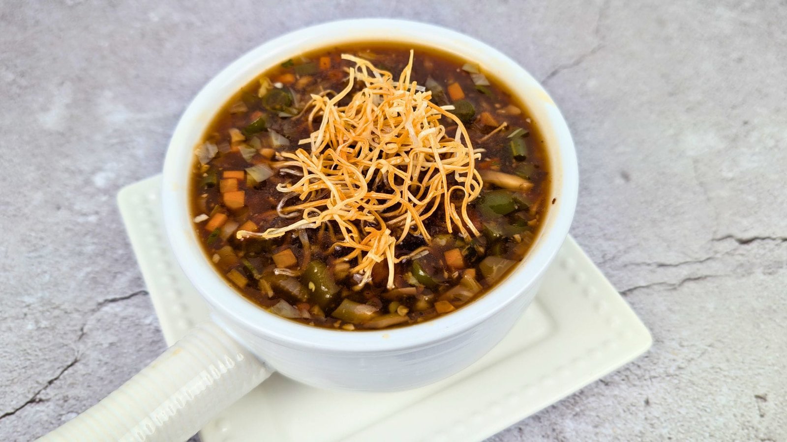 Manchow Soup in a white soup bowl