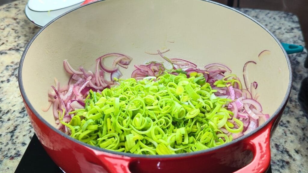 Adding Green part of the leeks in to the pot