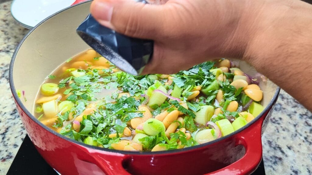 adding salt to the pot