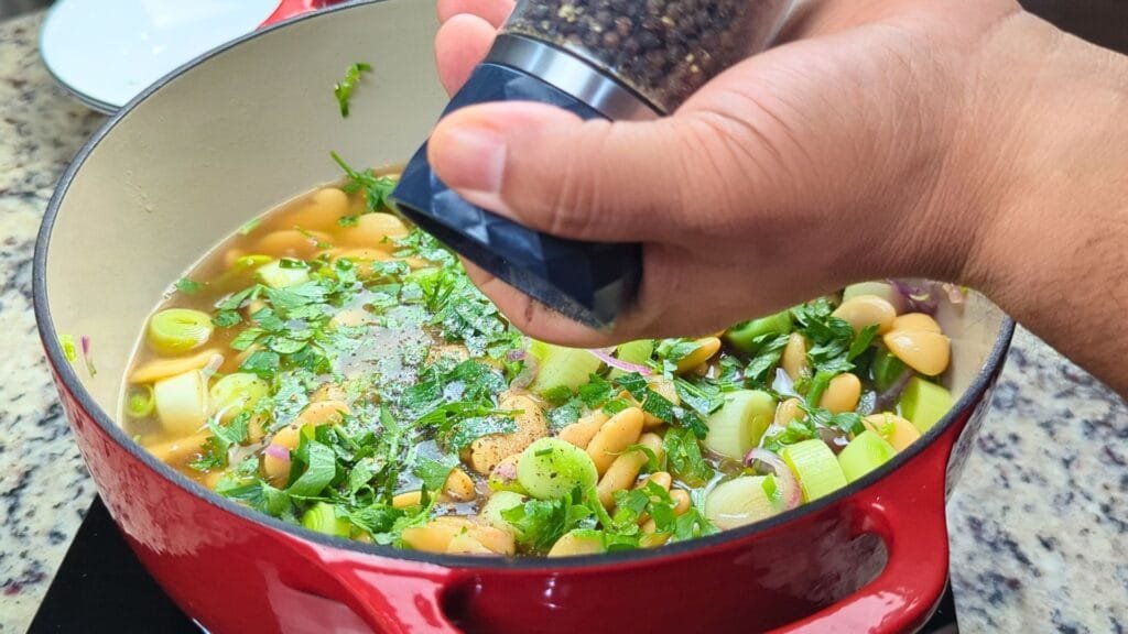 adding Black Pepper into the pot