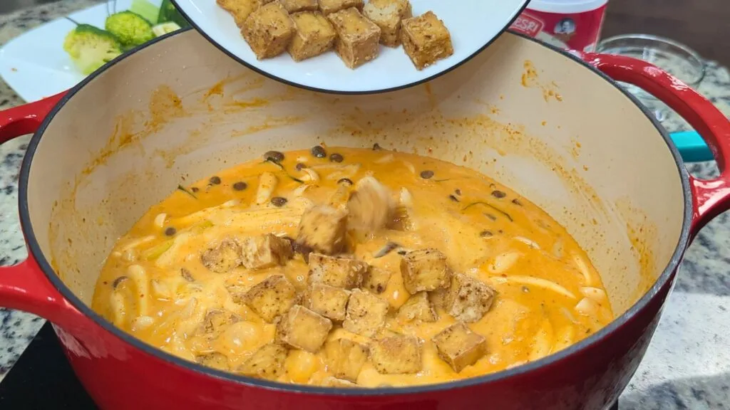 adding Fried Tofu to the curry paste