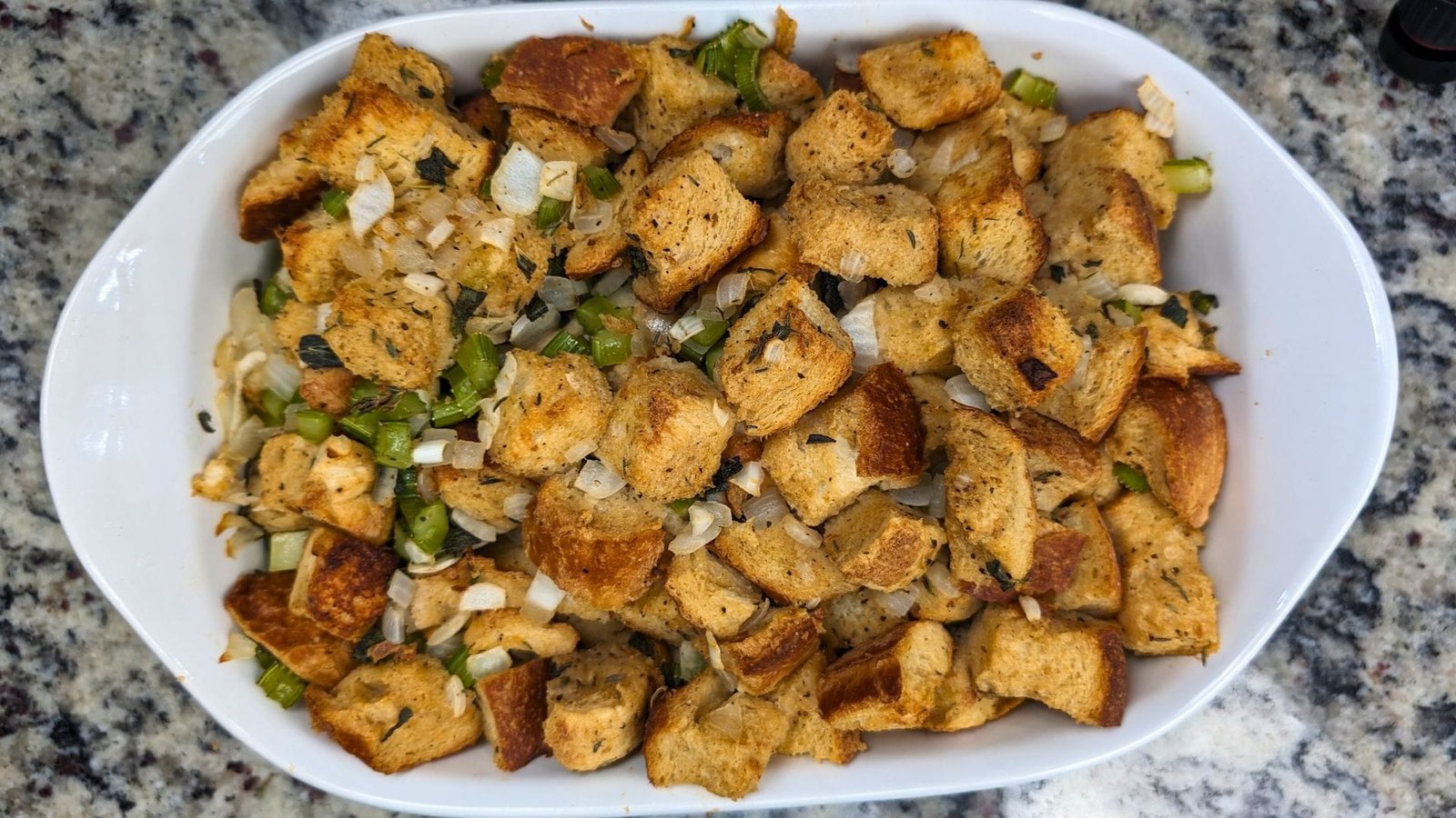 Stuffing in a white baking sheet