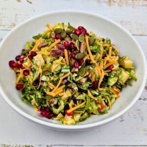 Brussels Sprouts and Apple Salad in a white bowl