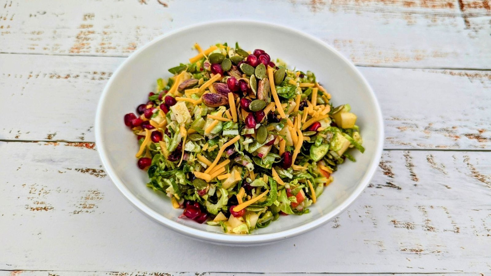 Brussels Sprouts and Apple Salad in a white bowl