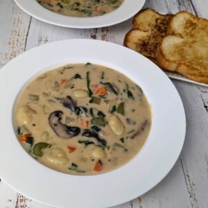 Vegan Gnocchi Soup served in a white plate