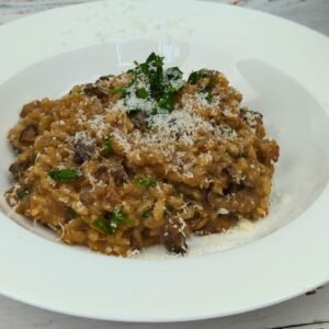 Creamy Mushroom Risotto served in a white bowl