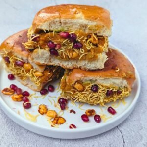 Dabeli served in a white plate.