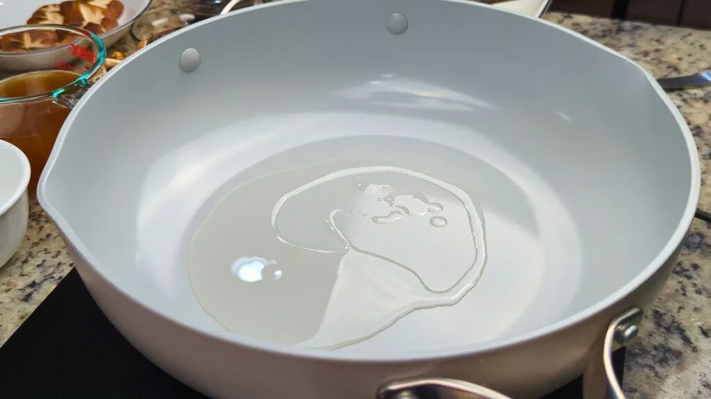 Heating up oil in a wok