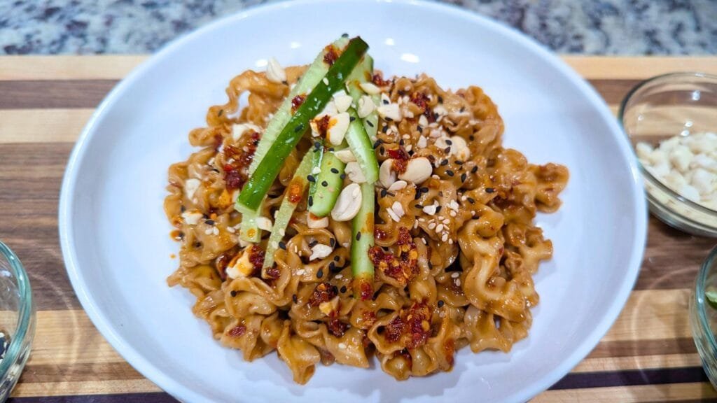 Spicy Peanut Noodles Served in a White plate