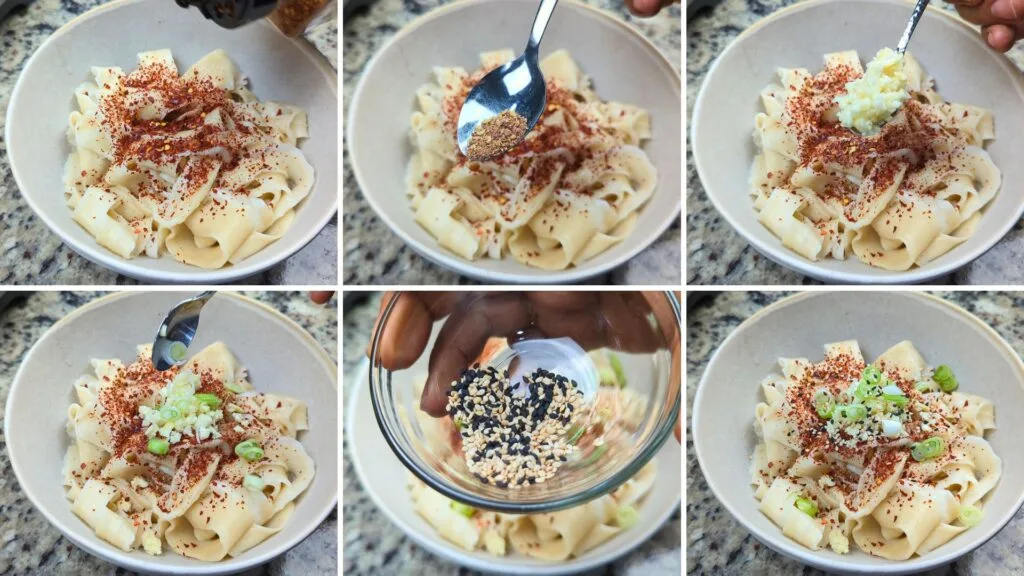 Adding Chili flakes, Garlic, Sichuan Peppercorn, Scallions tot he cooked noodles