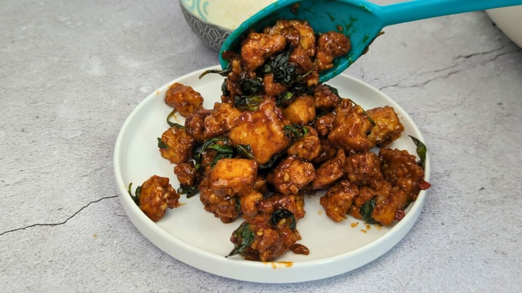 Serving Thai Basil Tofu Stir-Fry (Pad Krapow)