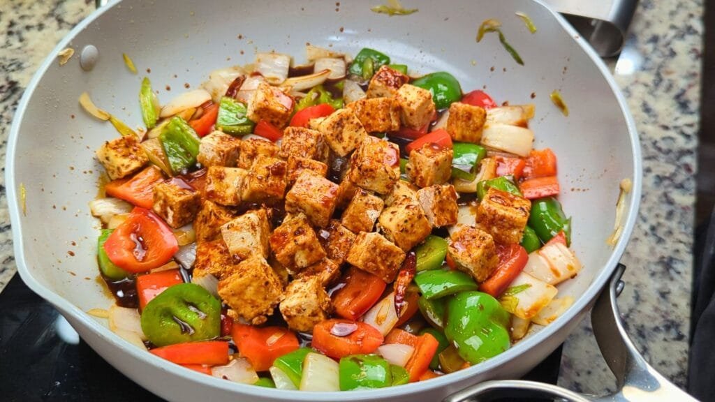 Let the water evaporate and thicken the sauce