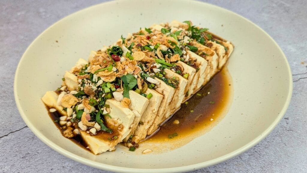 Steamed Tofu is served in a plate 
