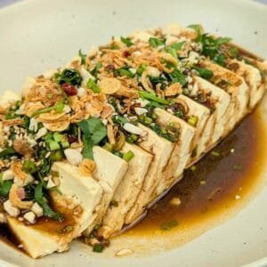 Steamed Tofu with Savory Sauce served in a plate
