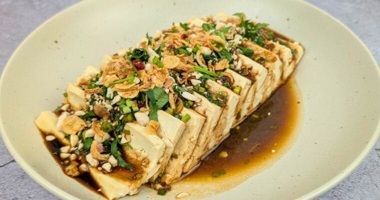 Steamed Tofu with Savory Sauce served in a plate