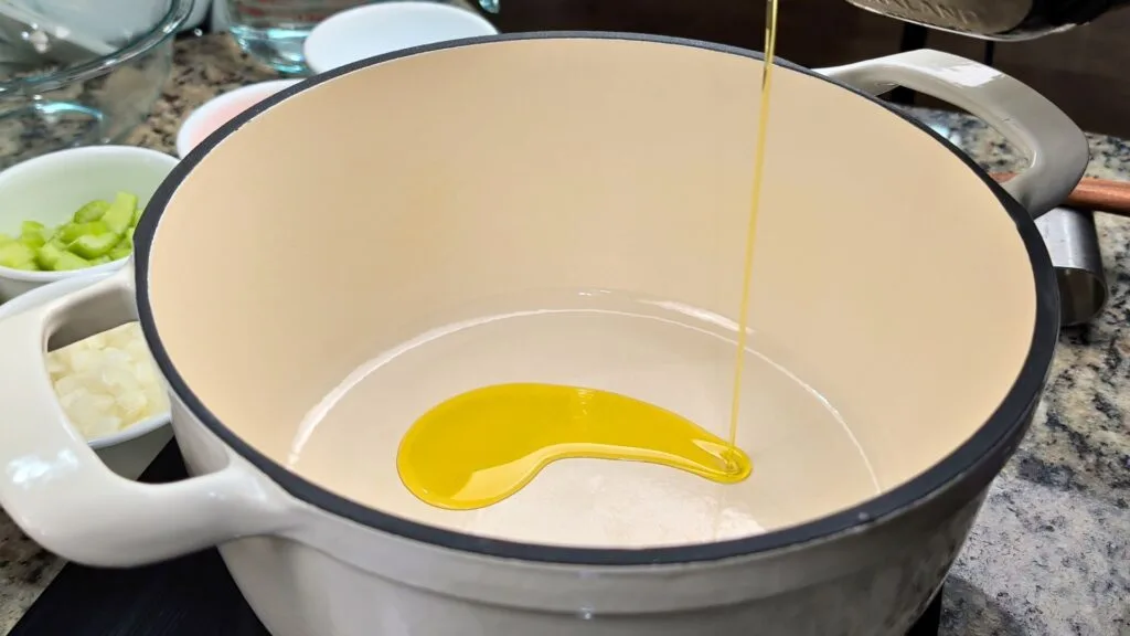 add oil to the hot Dutch Oven